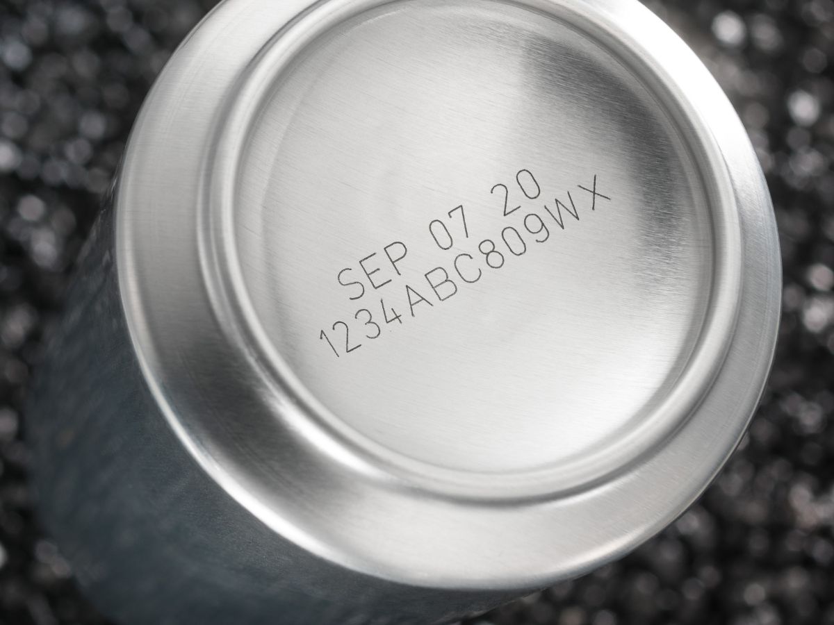 Laser date and batch code on an aluminium can end